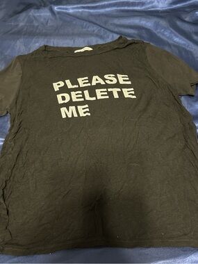 Black Graphic Tee with "PLEASE DELETE ME" Text